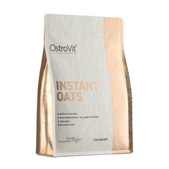 OstroVit Instant Oats package featuring strawberry flavor, nutritious oatmeal with high carbohydrates and no added sugar.