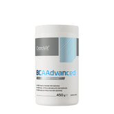 OstroVit BCAAdvanced supplement container, 450g, featuring BCAA, glutamine, and electrolytes in green apple flavor.