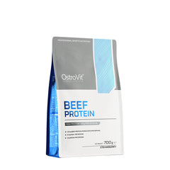 OstroVit Beef Protein powder packaging, high protein formula, 700g size, strawberry flavor, ideal for muscle building.