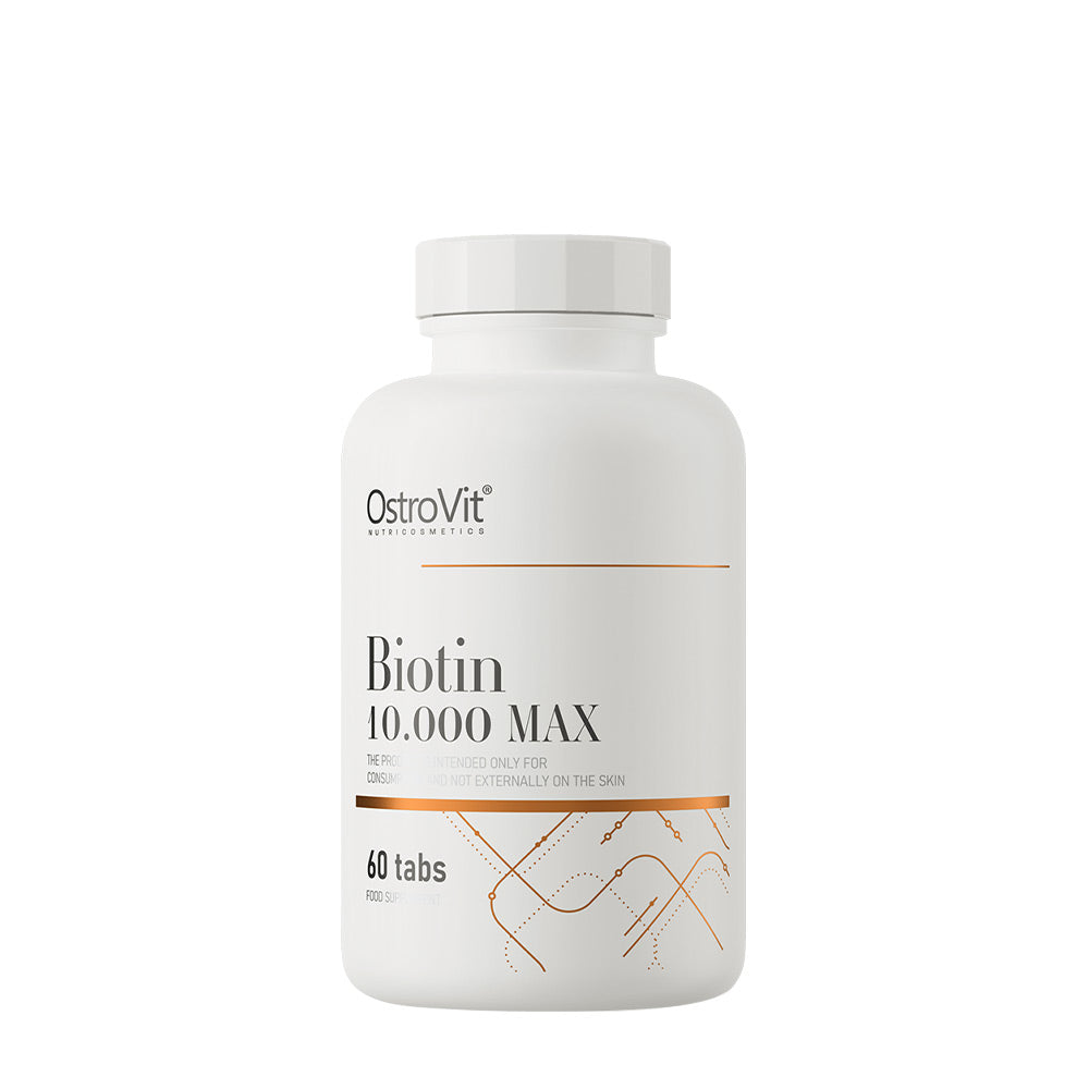 OstroVit Biotin 10.000 MAX supplement bottle with 60 tablets, supporting healthy hair and skin.