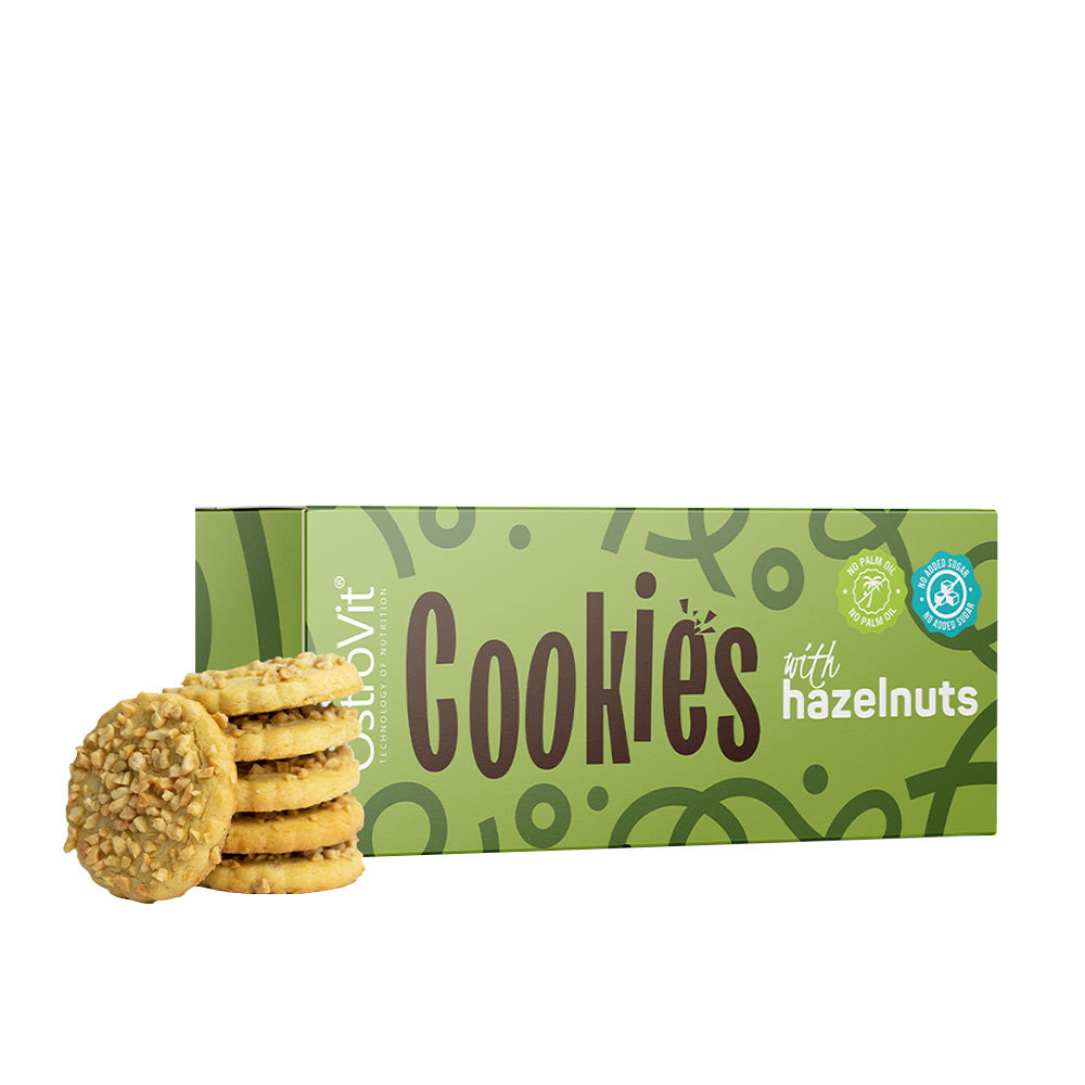 OstroVit cookies with hazelnuts packaged box and stacked cookies on a white background.