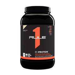 R1 Protein by Rule One, 100% whey protein isolate with 25g protein and zero additives, packaged in a black tub.
