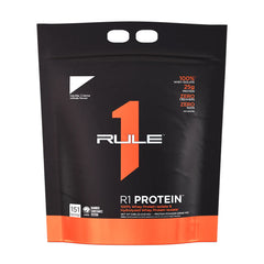 R1 Protein powder packaging showcasing 100% whey isolate with 25g protein per serving and zero added fillers.