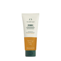 The Body Shop Vitamin C Face Polish 100ml, an exfoliating scrub for all skin types, promoting radiant and revitalized skin.