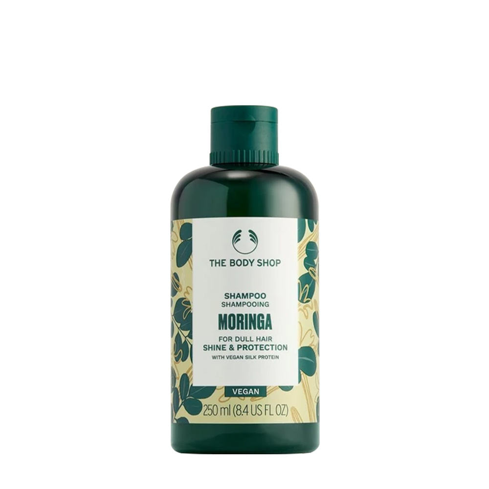 The Body Shop Moringa Shampoo bottle, 250ml, for shine and protection on dull hair, vegan formula.