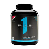 R1 Whey Blend protein powder container with 24g fast-acting protein per serving, rich in BCAAs and glutamine.