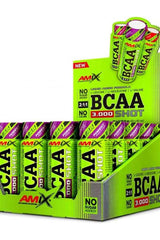 Amix BCAA 3000 Shot in vibrant packaging, 20 x 60 ml, promoting muscle mass support, no sugar added.