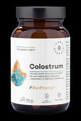 Aura Herbals Colostrum supplement bottle with 700 mg colostrum and Bioperine, 90 capsules for immune support.