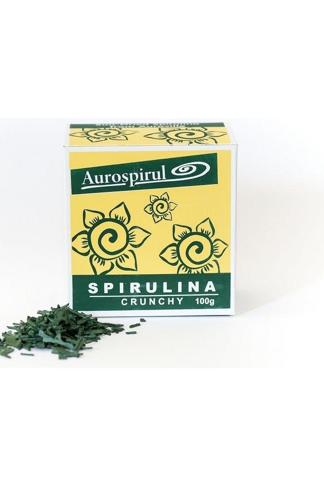 Aurospirul Spirulina Crunchy 100g packaging with green and yellow design, showcasing healthy nutritional supplement.