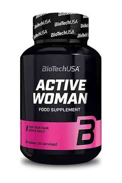 BioTechUSA Active Woman food supplement bottle with pink label for hair, skin, and nails, 60 tablets.