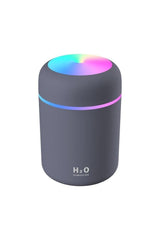 bioU H2O Air Humidifier with LED light, essential oil diffuser and USB plug for improved air quality.