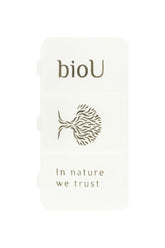 bioU pill box with three compartments for easy separation of capsules and tablets, featuring nature-inspired design.