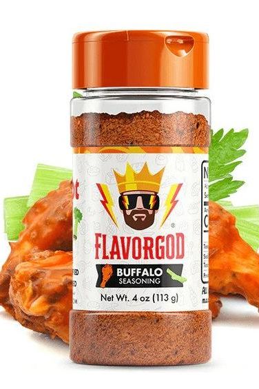 FlavorGod Buffalo Seasoning bottle with buffalo wings and celery, perfect for adding umami flavor and spice.