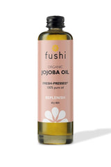 Fushi Organic Jojoba Oil bottle, 100ml, fresh-pressed for nourishing and replenishing dry skin.