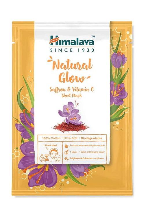 Himalaya Natural Glow Saffron & Vitamin C Sheet Mask packaging, featuring floral design and eco-friendly details.