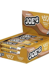 Weider Joe's Soft Bar display box, featuring chocolate-caramel flavored protein bars, high protein and low sugar.