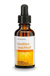 Kräuterhaus Sanct Bernhard Carrot Facial Care Oil in a dark glass bottle with dropper cap.