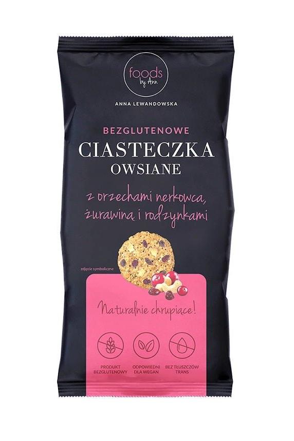 Gluten-free oat cookies with cashews and cranberries, packaged in a colorful bag.