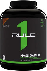 Rule One Mass Gainer protein powder for muscle gain, strength, and recovery; 1220 calories per serving.