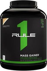 Rule One Mass Gainer protein powder, high-calorie formula for muscle growth and recovery.