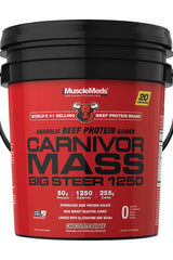 MuscleMeds Carnivor Mass Big Steer protein gainer in Chocolate Fudge flavor, featuring 50g protein and 720 muscle-building calories.
