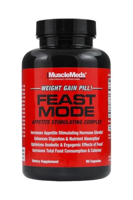 MuscleMeds Feast Mode weight gain pills in a black bottle with appetite stimulating complex label, 90 capsules.