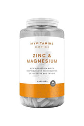 Myprotein Myvitamins Zinc & Magnesium capsules in a clear jar for immune support and fatigue reduction.