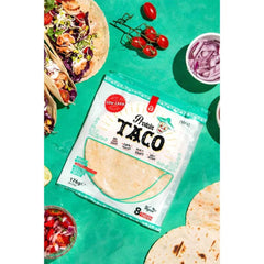 Nanosupps Protein Taco package on a vibrant green background with tacos and fresh ingredients.