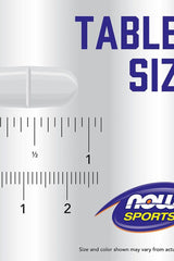 Now Foods tablet size measurement with a ruler, showcasing the dimensions of Arginine 1000 mg tablets.