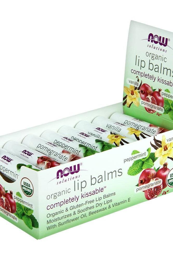 Now Foods assorted lip balms box featuring vanilla, peppermint, and pomegranate flavors with moisturizing ingredients.