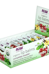 Now Foods assorted lip balms box featuring vanilla, peppermint, and pomegranate flavors with moisturizing ingredients.
