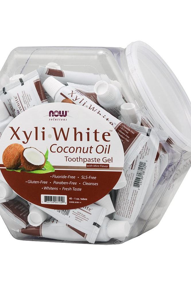 Now Foods XyliWhite Coconut Oil Toothpaste Gel tubes in a container, fluoride-free with mint flavor, 40 x 29 ml.