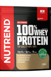 Nutrend 100% Whey Protein package featuring strawberry flavor, 22g protein per serving, gluten-free, and no artificial colors.