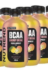 Nutrend BCAA Energy Drink with Yuzu and Apricot flavor, 330 ml bottles, energizing and sugar-free beverage.