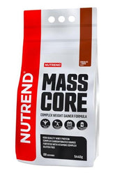 Nutrend Mass Core protein powder package for muscle gain, featuring gluten-free whey protein and vitamin C for recovery.