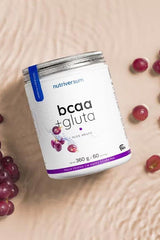 Nutriversum BCAA + GLUTA supplement jar with blue grape flavor, sugar-free formula, and 360g capacity.