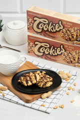 Nutriversum cookies on a plate with milk, showcasing no added sugar and healthy ingredients.