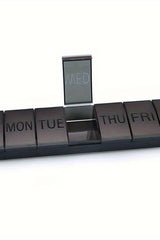 Oly - Maxi Pill Box with compartments labeled for each day of the week, designed for organizing daily medications.