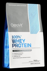 OstroVit 100% Whey Protein packaging, high protein content, white chocolate flavor, 700g.