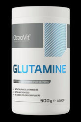 OstroVit Glutamine supplement tub, 500g, featuring lemon flavor and info on ingredients.
