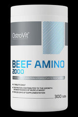 OstroVit Beef Amino 2000 mg protein supplement in a 300 tablet container for athletes.