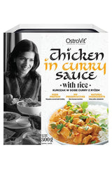 OstroVit Chicken in Curry Sauce with Rice packaging featuring vibrant curry dish and natural ingredients, 300g.