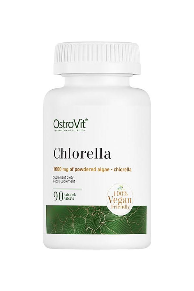 OstroVit Chlorella supplement bottle with 90 vegan tablets, rich in protein, iron, and vitamins.