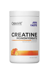 OstroVit Creatine Monohydrate orange flavored supplement container with 500g net weight