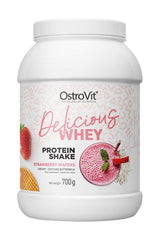 OstroVit Delicious WHEY protein shake with strawberry wafers flavor in a white container, net weight 700g.