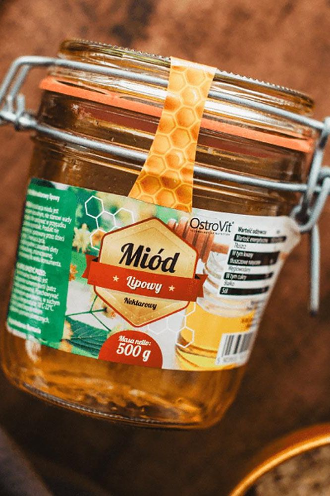 OstroVit Linden Honey jar, 500 g, showcasing natural and tasty honey for meals, without additives or preservatives. OstroVit Linden Honey jar, 500 g, showcasing natural and tasty honey for meals, without additives or preservatives.