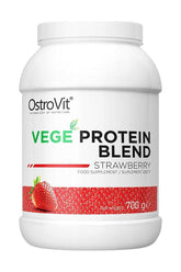 OstroVit VEGE Protein Blend in Strawberry flavor, 700g container, a plant-based supplement for building muscle.