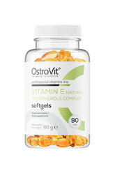 OstroVit Vitamin E Natural Tocopherols Complex softgels in a bottle with 90 capsules, dietary supplement for antioxidant support.