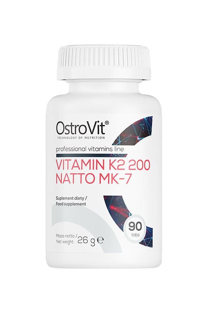 OstroVit Vitamin K2 200 Natto MK-7 supplement bottle with 90 tablets for bone health and blood coagulation. OstroVit Vitamin K2 200 Natto MK-7 supplement bottle with 90 tablets for bone health and blood coagulation.