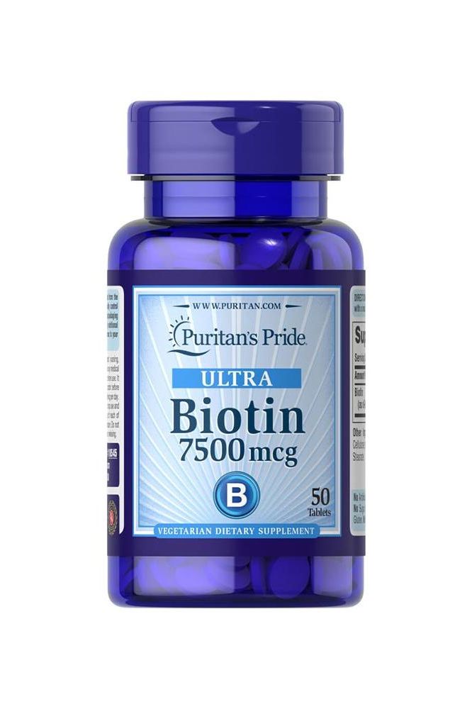 Puritan's Pride Biotin 7500 mcg dietary supplement bottle with 50 tablets for healthy skin and hair. Puritan's Pride Biotin 7500 mcg dietary supplement bottle with 50 tablets for healthy skin and hair.